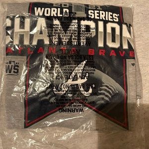 Unisex size medium Atlanta Braves World Series champion shirt.